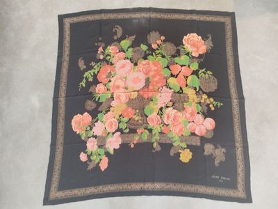 black silk scarf with pink and yellow flowers on a black background