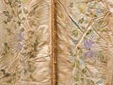 an image of a close up of a jacket with flowers on it