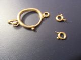 three pieces of metal that have been placed on a table