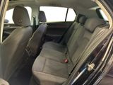 the back seats of a car are empty with no one in it