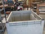 a large white box sitting in the middle of a room