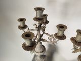 three candles that are sitting on a table