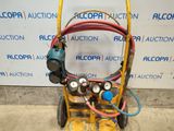 an image of a machine with a hose attached to it