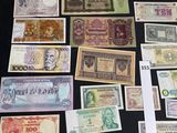 many different types of foreign currency on the table