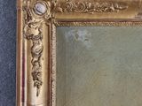 a picture of a gold frame with a clock on it