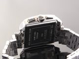 a close up of a wrist watch on a table
