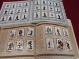 a book with pictures of people on it on a table