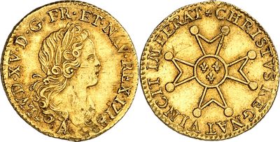 une pièce d'or sur laquelle figurent le visage d'une femme et une étoile