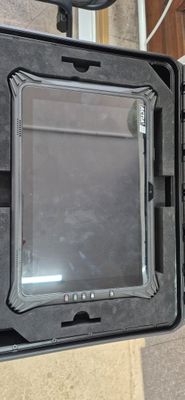 a black box with a mirror on it sitting on the floor