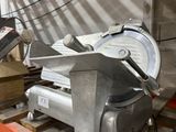 a machine that is sitting on a pallet in a warehouse