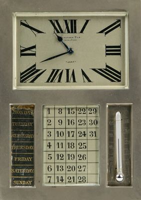 Horloge de table calendaire et thermomètre. Cadran signé "Ju…