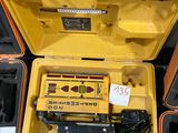a yellow tool case with a black handle and a yellow tool case with a black handle and a yellow tool case with a black handle and a black handle