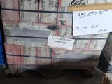 a large stack of boxes sitting on a pallet in a warehouse