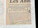 an old newspaper with a lot of writing on it