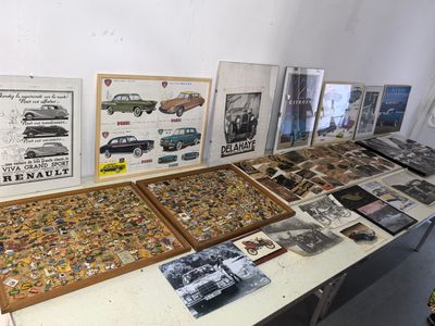 many different types of cars on display on the table