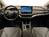 the interior of a car with a steering wheel, dashboard, and display screen