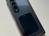 a close up of a cell phone on a table