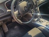 a picture of a car dashboard with a steering wheel