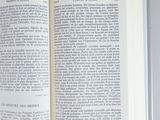 a open book that is sitting on a table