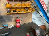 a picture of a workbench in a garage with tools on it