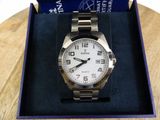 the watch is in the box on the table ready to be used