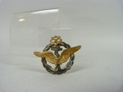 une image représentant un insigne sur lequel est représenté un oiseau