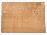 an old piece of wood with a hole in the middle of it