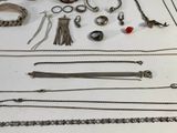 many different types of jewelry on the table