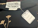 a close up of a dress with a label on it
