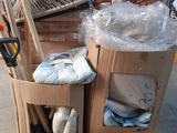 a cart full of items that are sitting on top of a pallet