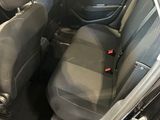 a black car with two seats in the back of it