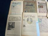 a lot of old books that are on a table