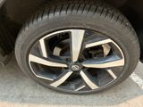 a close up of a tire on a car ' s rim