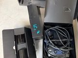 a box of electronics that is sitting on the floor