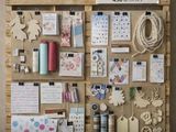 a picture of a bulletin board with lots of craft supplies on it