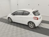 a picture of a white car parked in a garage