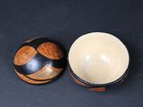 a small bowl and a small bowl on a table