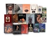 a lot of books that are sitting on a table