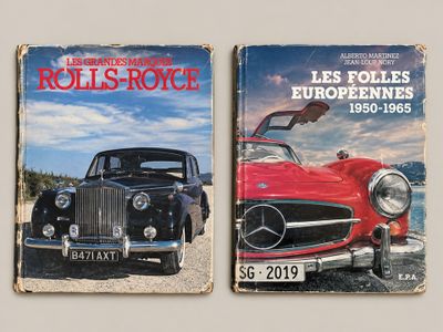 two books on the cover of rolls royce and european cars