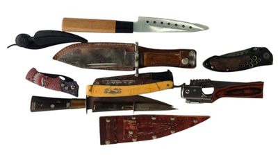 many different types of knives on a white background