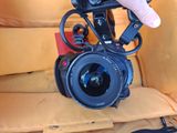 a person that is holding a camera in their hand