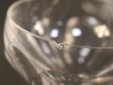 a glass bowl that is sitting on top of a table