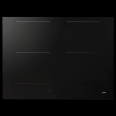 gros plan d'une cuisinière noire à quatre brûleurs