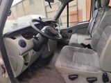 a car that has a steering wheel and a seat in it
