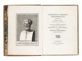 un vieux livre sur lequel figure l'image d'un homme barbu
