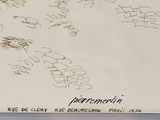 a drawing on a piece of paper with writing on it