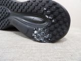 a close up view of a pair of shoes on the ground