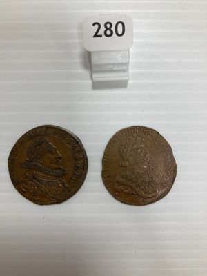 deux pièces, dont l'une présente une face et l'autre un revers
