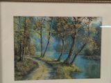 framed oil painting of a river and trees in a wooded area