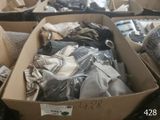 several boxes of clothing are stacked on top of each other